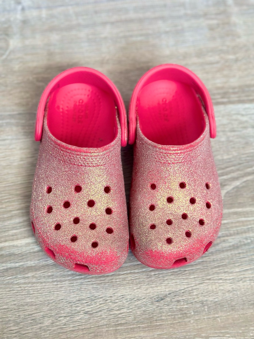 CROCS Kids Sparkle Clogs in Hot Pink